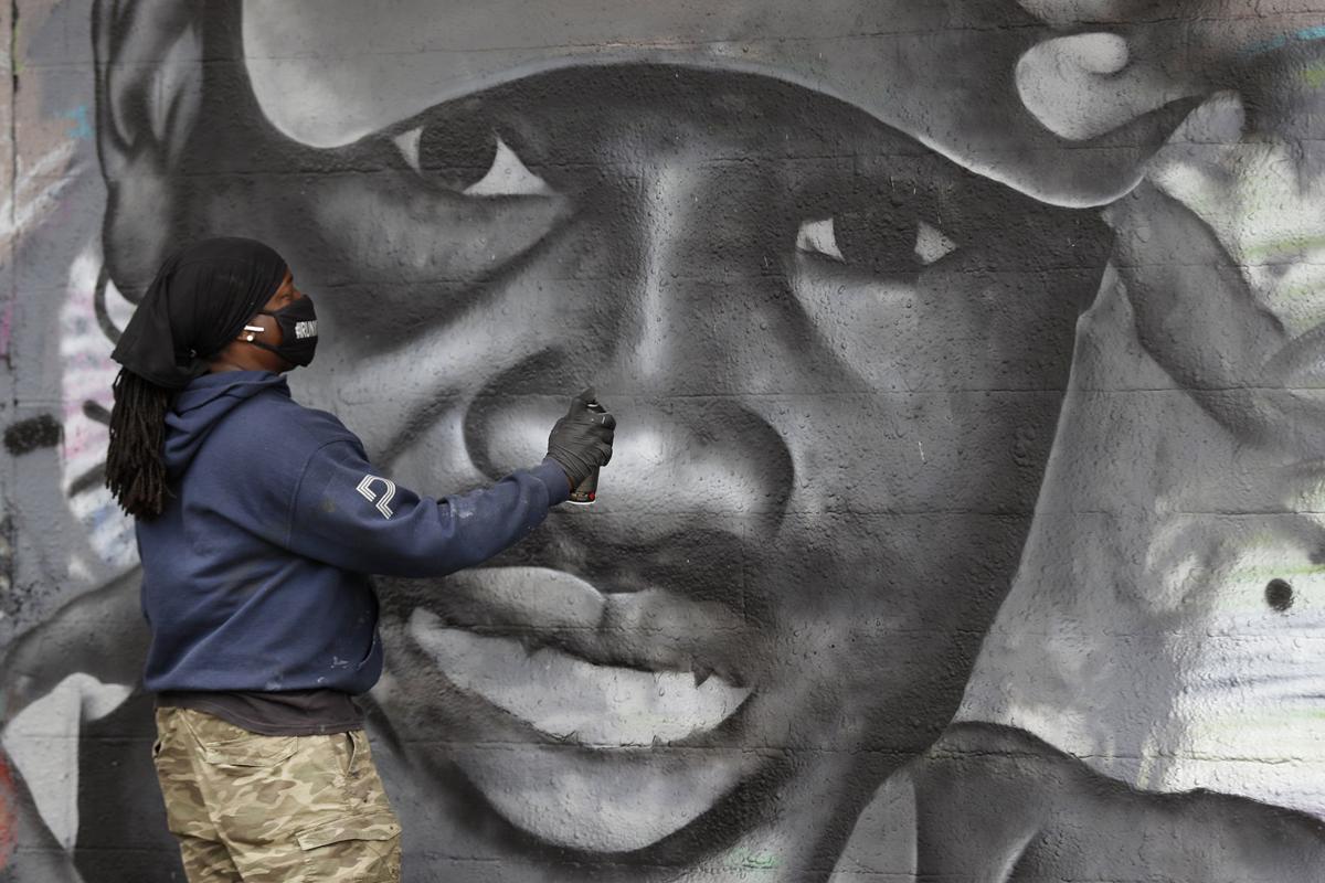 Virus Outbreak Texas Arbery Mural