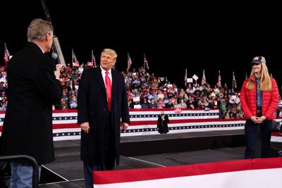 FILE PHOTO: U.S. President Donald Trump campaigns for Republican U.S. senators David Perdue and Kelly Loeffler, in Valdosta, Georgia