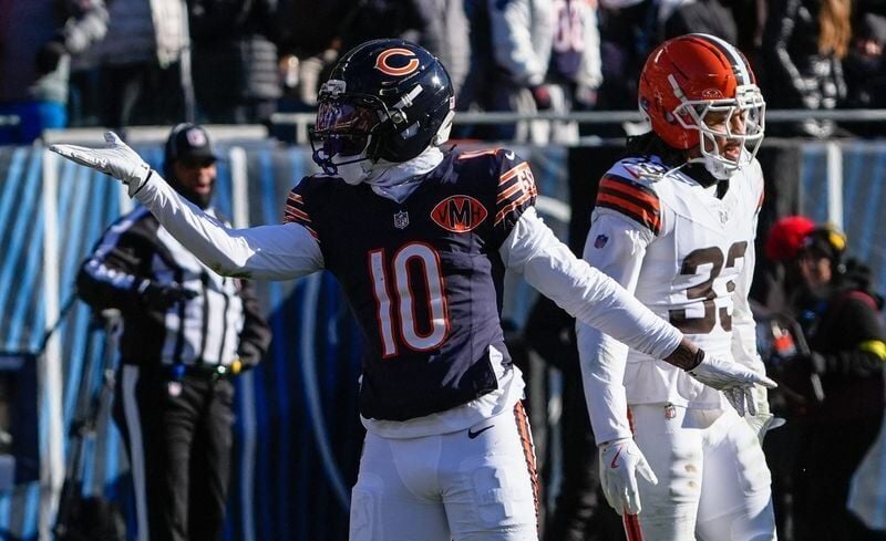 Dec 14, 2025; Chicago, Illinois, USA; Chicago Bears wide receiver Luther Burden III (10) celebrates after a first down during the first quarter against the Cleveland Browns at Soldier Field. Mandatory Credit: David Banks-Imagn Images