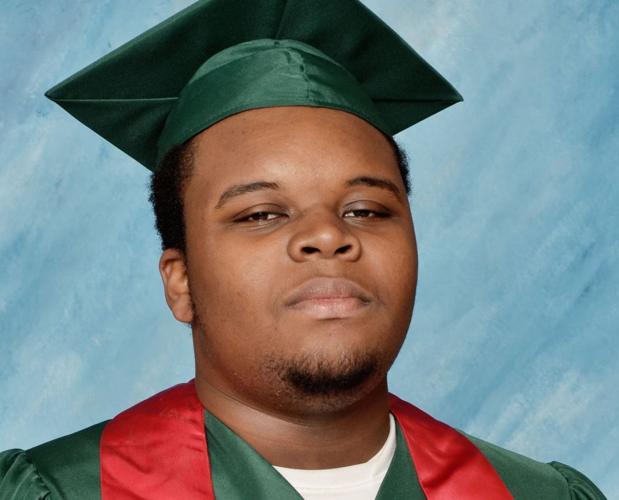 Michael Brown in graduation cap and gown