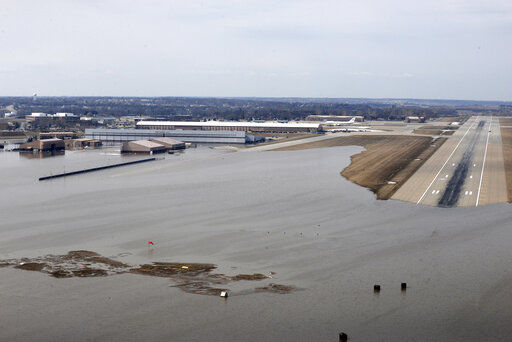 Flood-damaged Air Force base near Omaha reopens runway