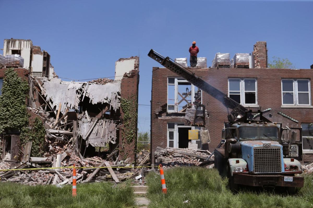 Two demolition workers injured in building collapse in St. Louis Law