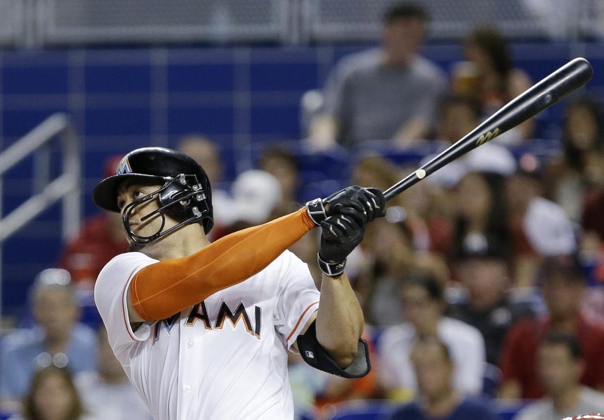 Miami Marlins center fielder Giancarlo Stanton returns to the