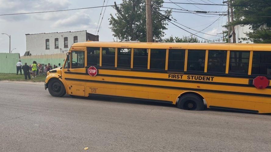School bus in sinkhole