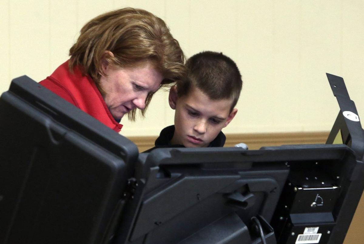 Early morning voters cast ballots in Presidential Election