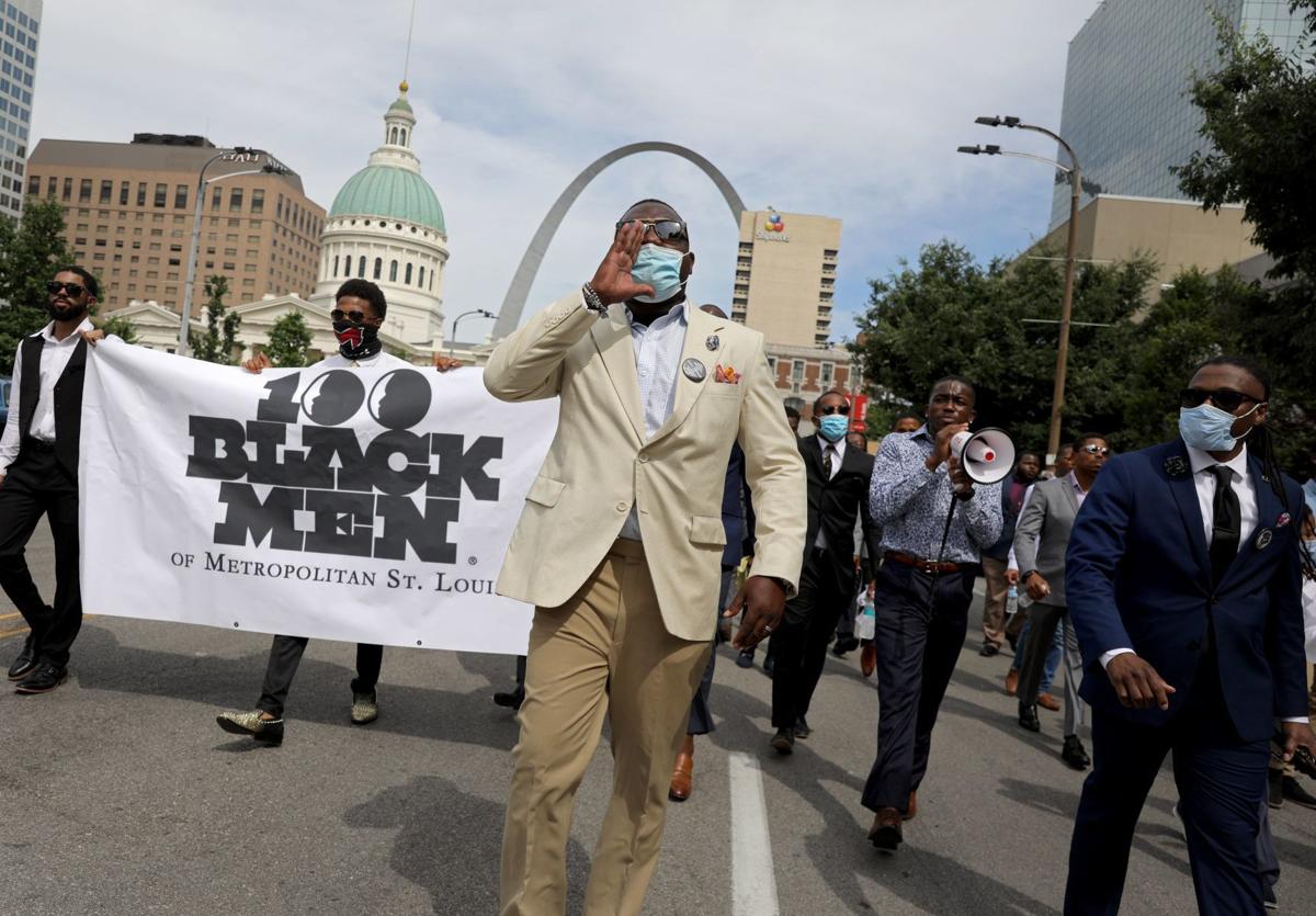 Black Men Put On Suits And Ties To March Against Oppression In St Louis Protests Continue In Florissant Metro Stltoday Com