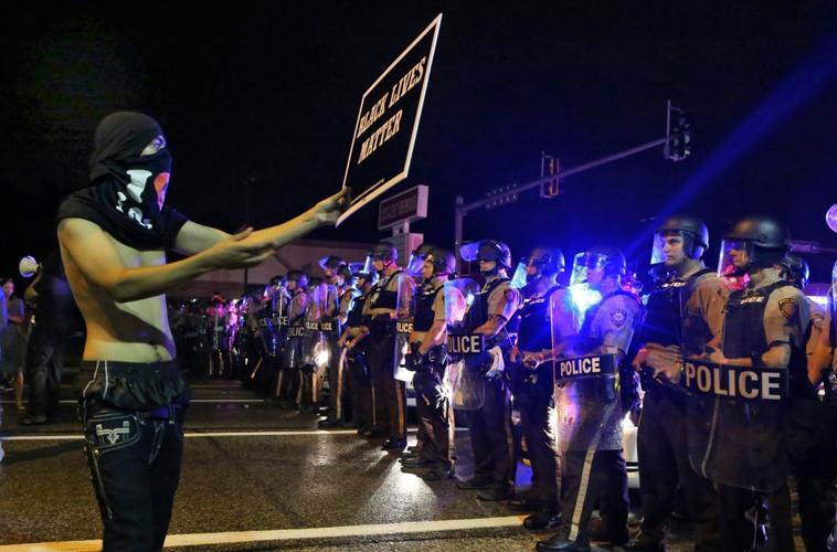 Young people move their protests to West Florissant Ave.