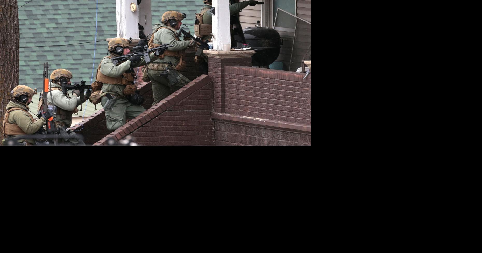 Standoff continues with man accused of shooting two Hermann police officers