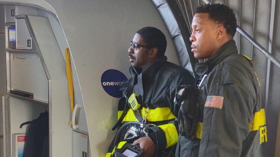 Firefighters outside plane that returned to Lambert shortly after takeoff