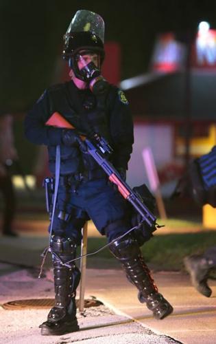 Riot breaks out, store burned