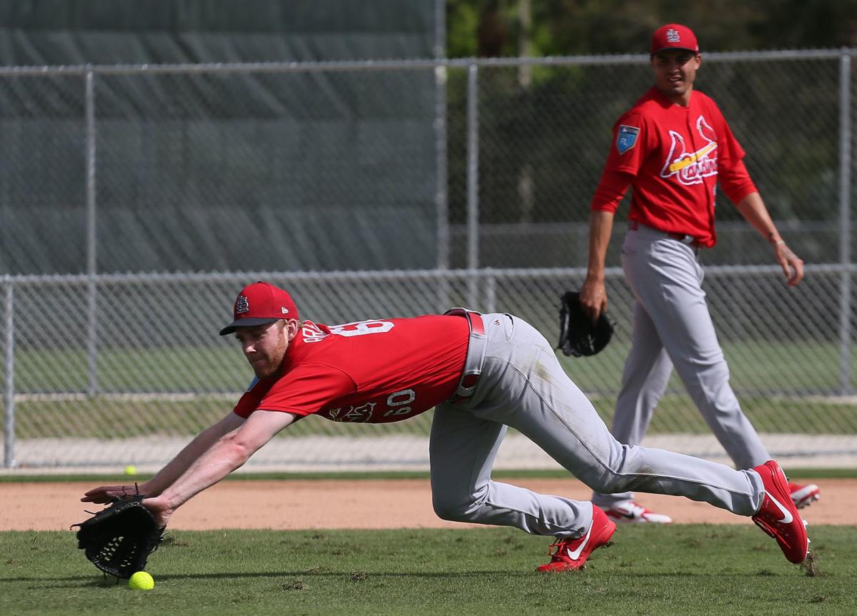 MLB roundup: Cardinals' Wainwright, Molina reach milestone