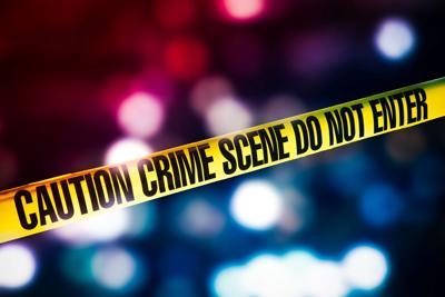 crime scene tape with red and blue lights on the background