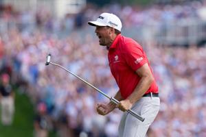 Keegan Bradley reacts after a birdie putt on the 18th hole to win the 2025 Travelers Championship golf tournament in Cromwell, Connecticut.