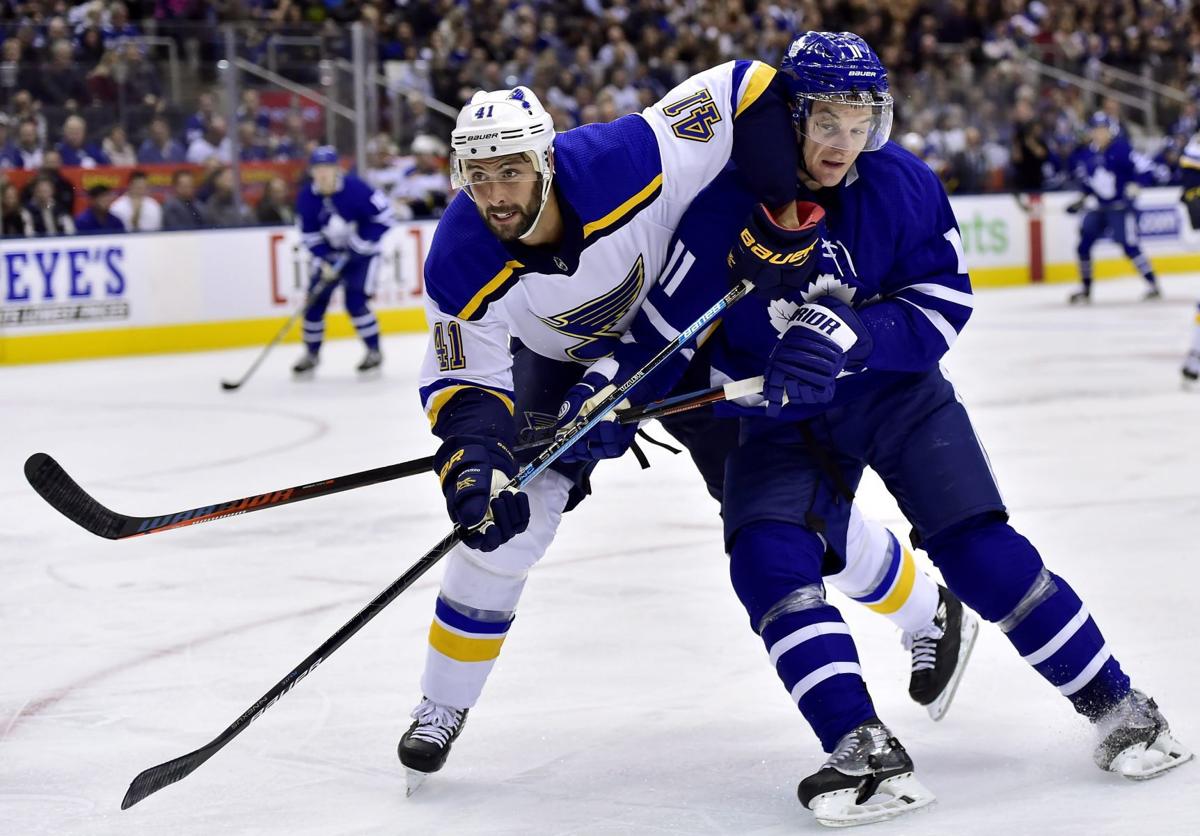 Toronto Maple Leafs center Zach Hyman (11) skates with the puck as