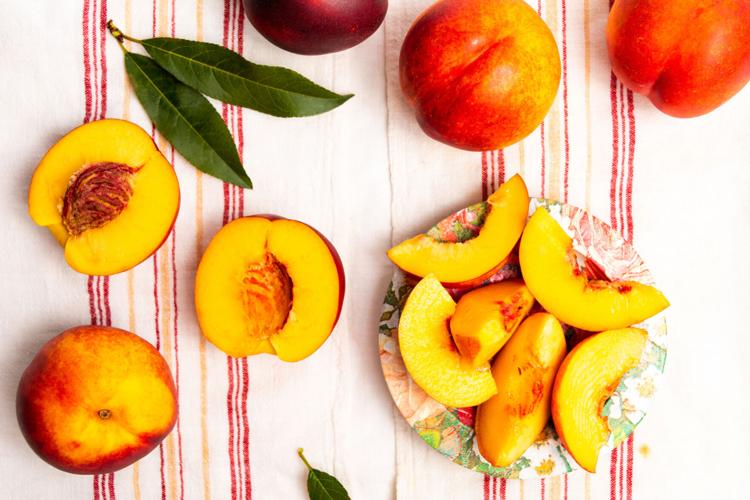 Fresh peach on a table top view