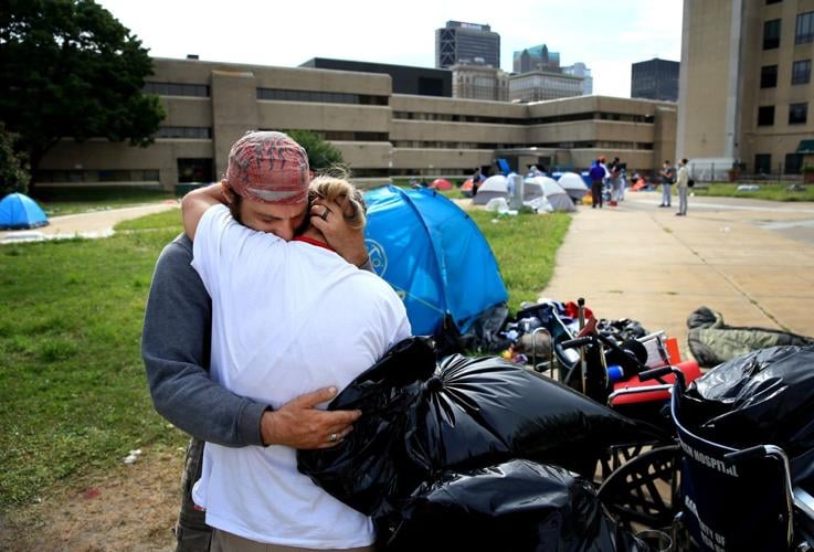 ѿý city workers remove homeless camp