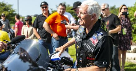 DeSantis signs Bible Pence hops on motorcycle at Roast and Ride rally in Iowa DeSantis signs Bible Pence hops on motorcycle at Roast and Ride rally in Iowa