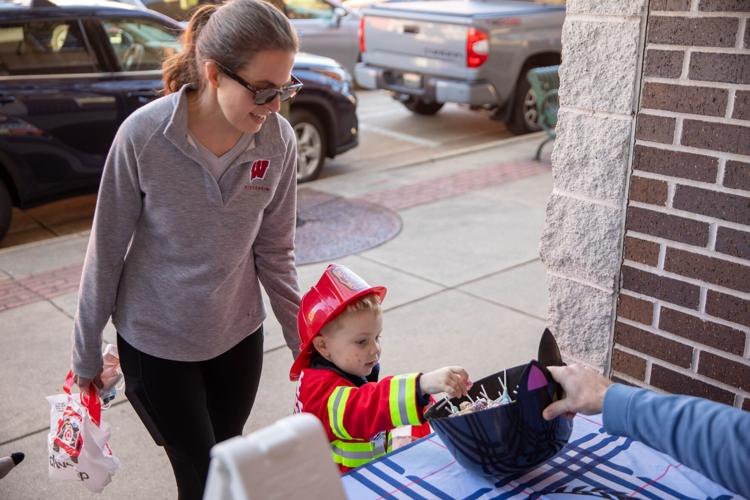Photos Trickortreaters fill downtown Stoughton for Main Street Trick