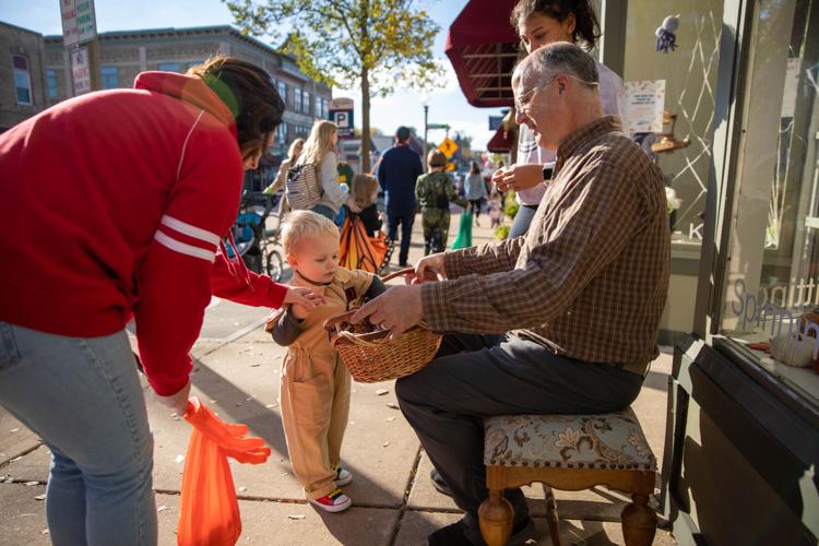 Photos Trickortreaters fill downtown Stoughton for Main Street Trick