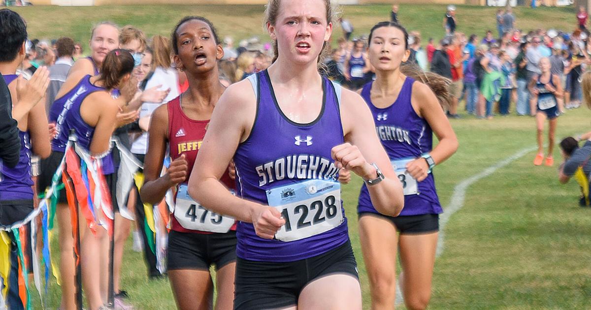 Girls cross country Stoughton’s Maddie Reott showing marked