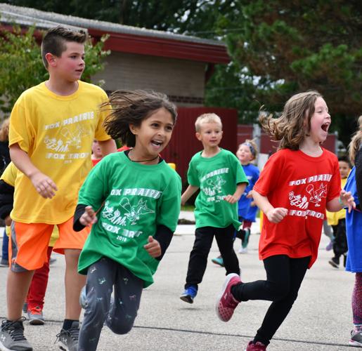 Photos from the annual Fox Trot at Fox Prairie Elementary School