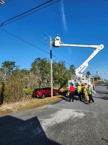 Vehicle crashes into power pole