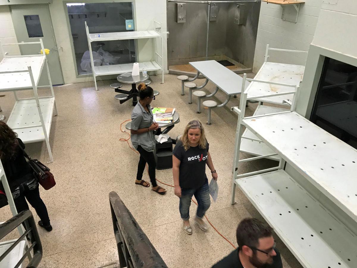 Former jail, a homeless center option, toured News