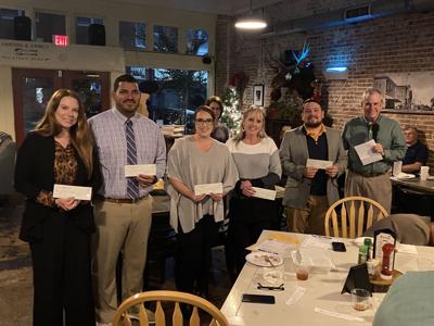 Kiwanis Club presents check to support education