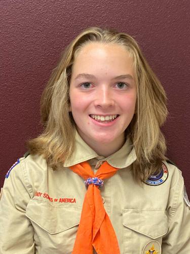 Young woman on trail to Eagle Scout