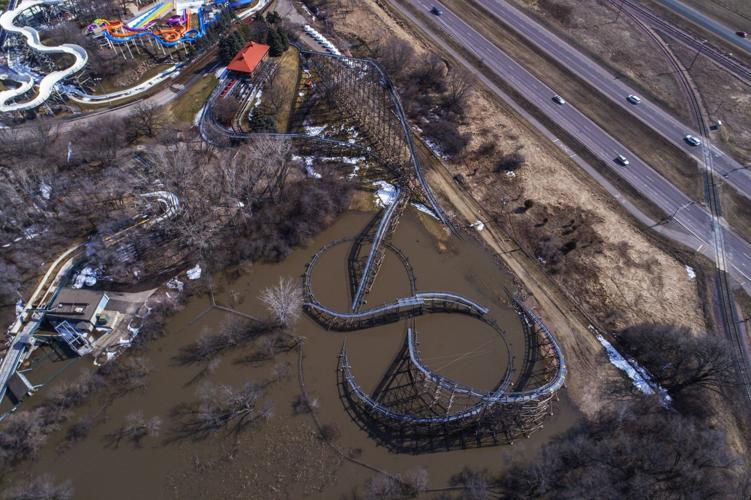 Roads and rollercoasters go under water as Minnesota River crests