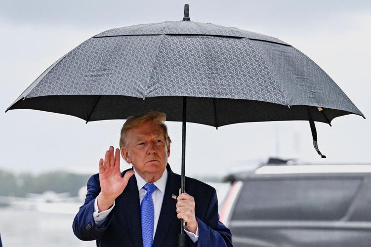 U.S. President Trump disembarks Air Force One at Joint Base Andrews