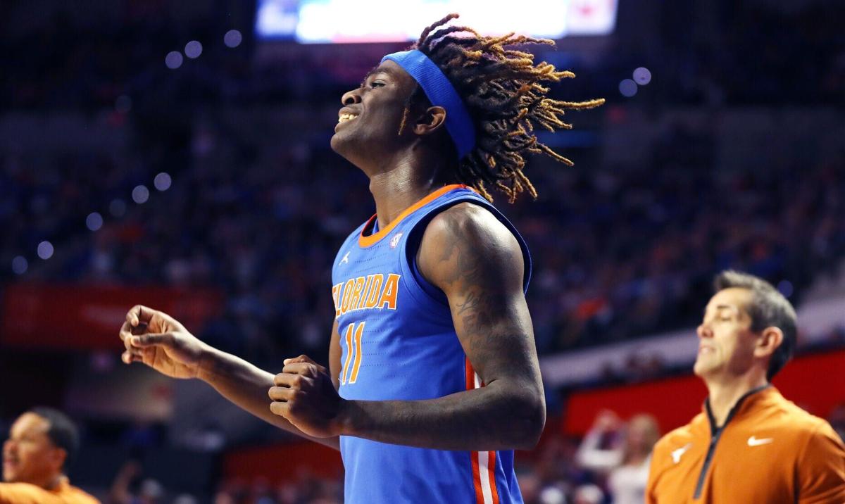 Florida guard Denzel Aberdeen celebrates during the Texas at Florida NCAA basketball game at the O’ Connell Center in Gainesville on Saturday, Jan. 18, 2025.
