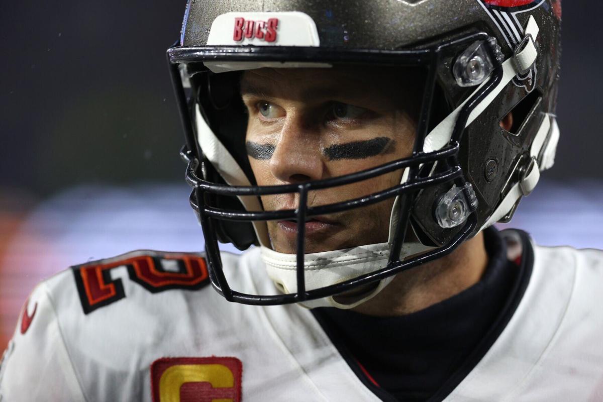 Tom Brady of the Tampa Bay Buccaneers looks on against the New England Patriots during the third quarter at Gillette Stadium on Sunday, Oct. 3, 2021 in Foxborough, Massachusetts.