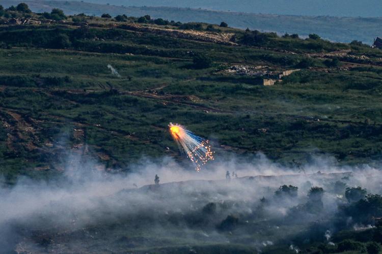 An explosion of what appears to be white phosphorus after an Israeli army attack in South Lebanon, as seen from the Israeli side of the Israel-Lebanon border