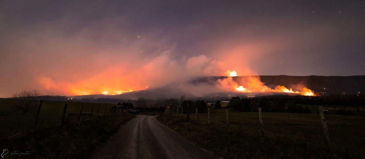 Crews battle scores of wildfires in Virginia, including a blaze in