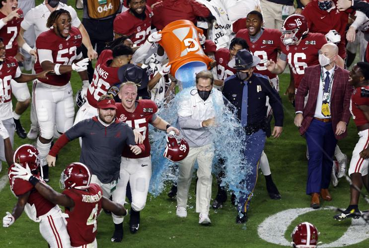 Head coach Nick Saban of the Alabama Crimson Tide is dunked with gatorade following the College Football Playoff National Championship game in-which they defeated the Ohio State Buckeyes 52-24 at Hard Rock Stadium on Jan. 11, 2021 in Miami Gardens, Flor...
