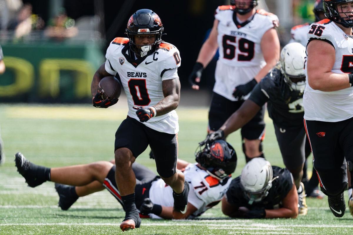 Running back Anthony Hankerson of the Oregon State Beavers carries the ball during the first half of the game against the Oregon Ducks at Autzen Stadium on Sept. 20, 2025, in Eugene, Ore..