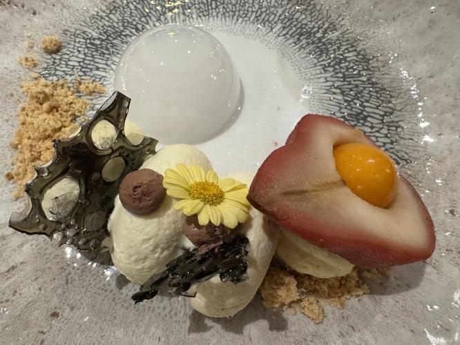 The ship pastry chef's elevated take on a classic French poached pear dessert, poire belle-Helene.