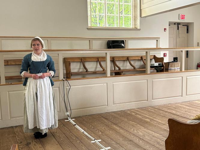 Anna Fiscarelli-Mintzer, as Betsy Ross, talks about the day George Washington, Robert Morris and her late husband's uncle George Ross visited to ask her to make a new American flag.