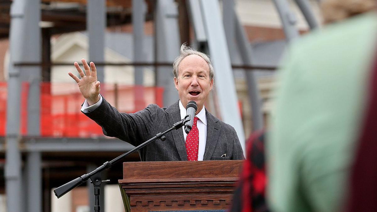 Christopher Newport University president Paul Trible talks about the new Fine Arts Center as they prepare to attach the final piece of steel to the structure Tuesday, Dec. 10, 2019.