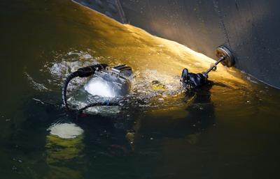 16 feet of worry: Divers brave danger in trying to save USS The Sullivans