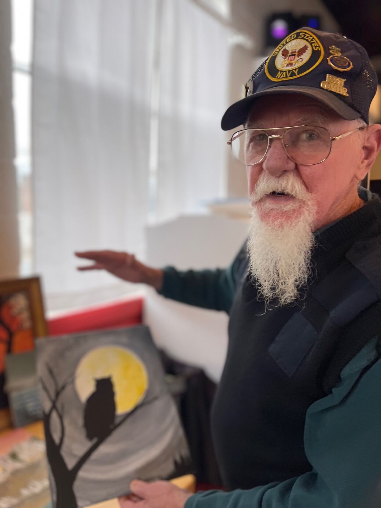Veteran donates paintings to auction off for a good cause