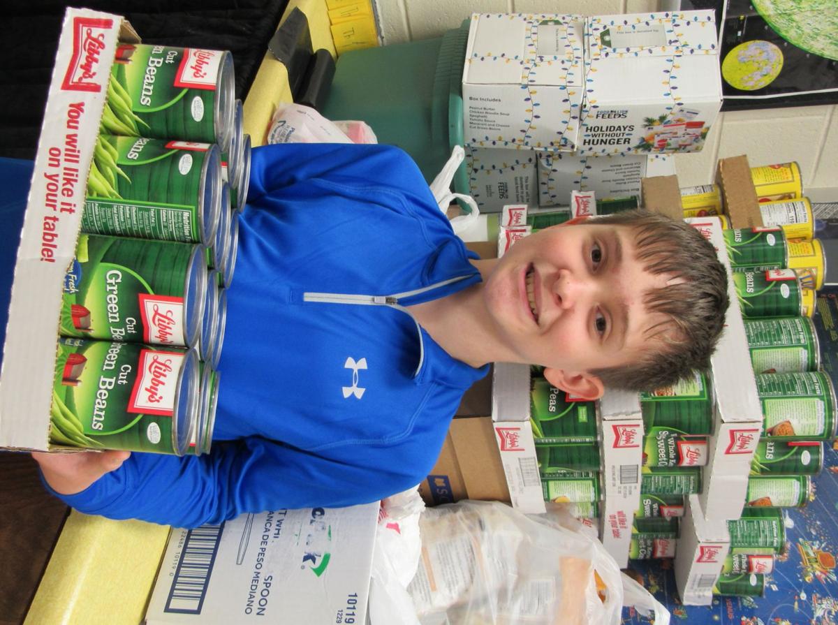 11 Year Old Donates Over 1 000 Cans Of Food To Box Out Hunger Latest Headlines Swvatoday Com
