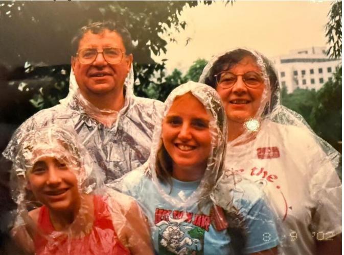 Robert and Angie Penna with daughters Robin and Angela at the Beijing Zoo in 2002.