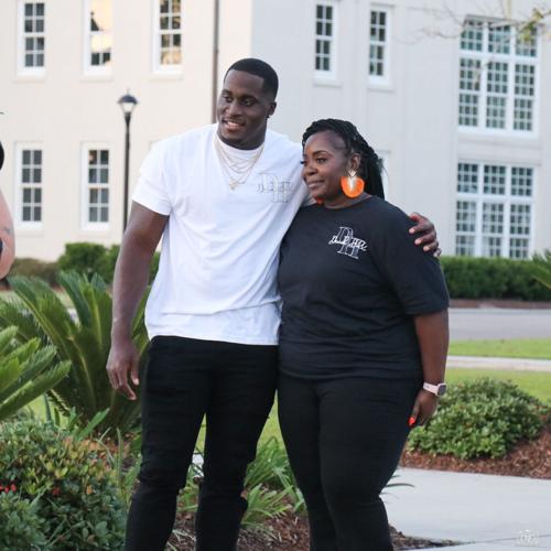 Seattle Seahawks linebacker Derick Hall and his mom, Stacy Gooden-Crandle.