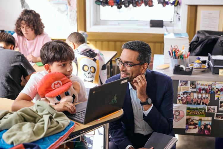 Aneesh Sohoni (right) is the CEO of Teach for America. He'd once dreamed of becoming a lawyer but said, "Once I met students, I realized I wanted to do this the rest of my life."