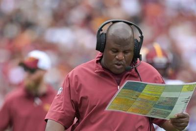Sep 10, 2023; Landover, Maryland, USA; Washington Commanders assistant head coach/offensive coordinator Eric Bieniemy walks down the sidelines during the first half against the Arizona Cardinals at FedExField. Mandatory Credit: Tommy Gilligan-Imagn Images
