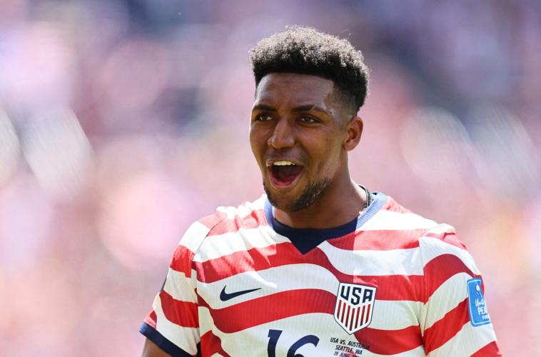 Alex Freeman of the U.S. celebrates after a match.