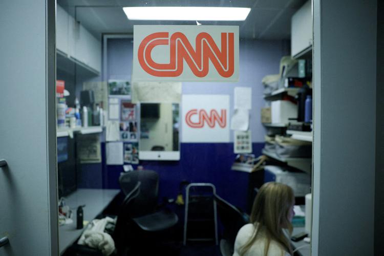 FILE PHOTO: The CNN booth at the White House after US President Donald Trump announced he would ban CNN, MS NOW, and Politico from the White House