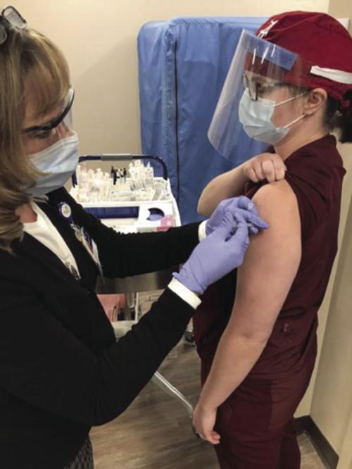 Emergency room nurse hopes vaccine brings life back to normal